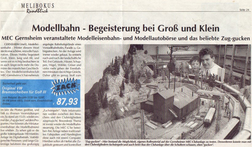 Historischer Zeitungsartikel aus dem Melibokus Rundblick mit der Überschrift „Modellbahn – Begeisterung bei Groß und Klein“. Die Fotos zeigen die Modellbahnanlage des MEC Gernsheim und Besucher an den Verkaufsständen der Modellbahnbörse.